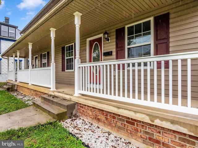 entrance to property with a porch