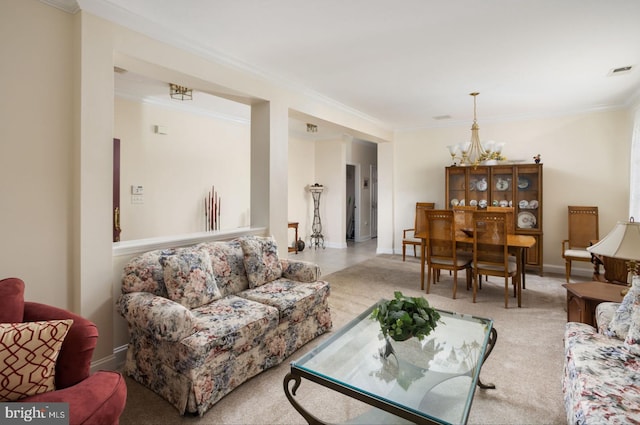 carpeted living room featuring ornamental molding and an inviting chandelier