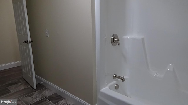 bathroom featuring shower / washtub combination