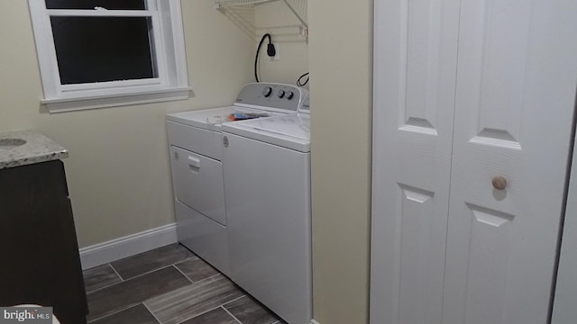 washroom with washing machine and dryer