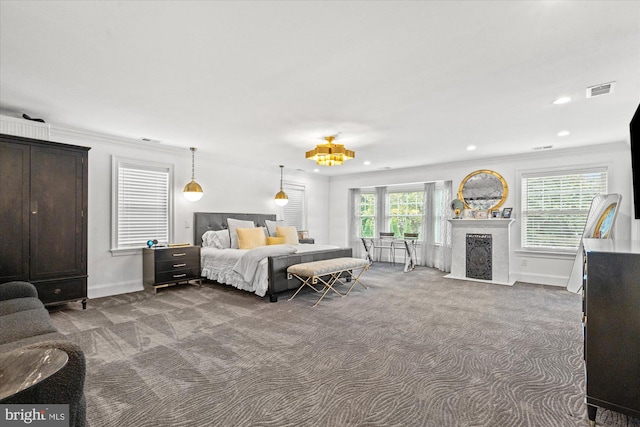 bedroom featuring carpet floors and crown molding