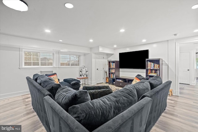 living room with light hardwood / wood-style flooring