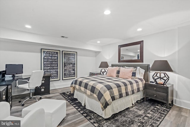 bedroom featuring wood-type flooring