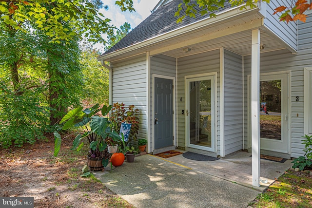 property entrance with a patio