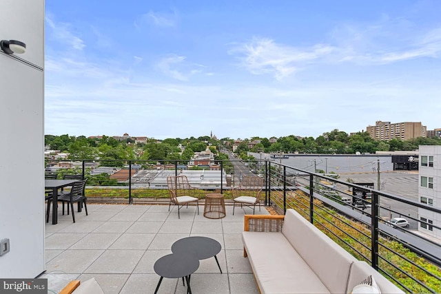 view of patio with a balcony