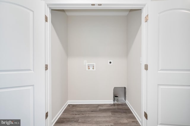 laundry area featuring hookup for a washing machine, dark hardwood / wood-style floors, and electric dryer hookup