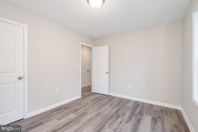 unfurnished bedroom featuring light hardwood / wood-style floors