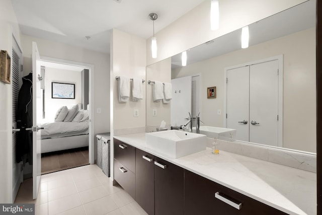 bathroom featuring vanity and tile patterned flooring