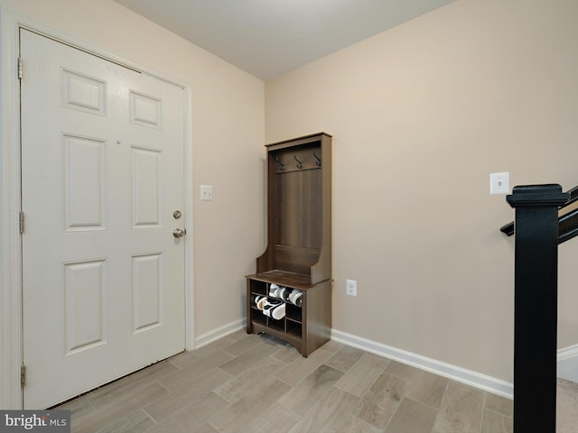 foyer entrance with light hardwood / wood-style floors