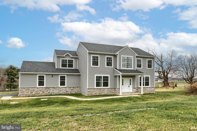 view of front of property with a front lawn