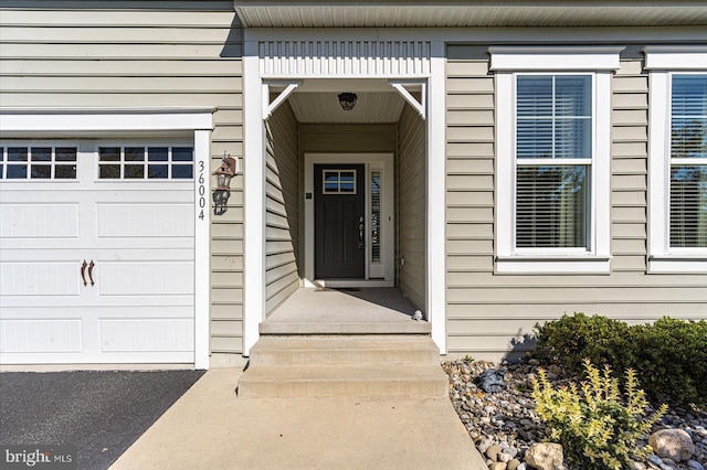 property entrance featuring a garage