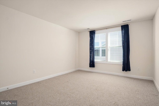 empty room with carpet floors