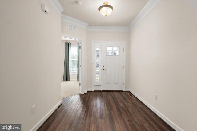 entrance foyer with crown molding and dark hardwood / wood-style flooring