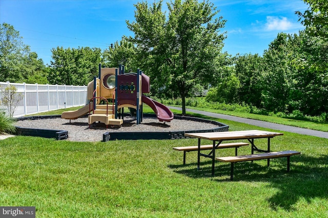 view of playground featuring a yard