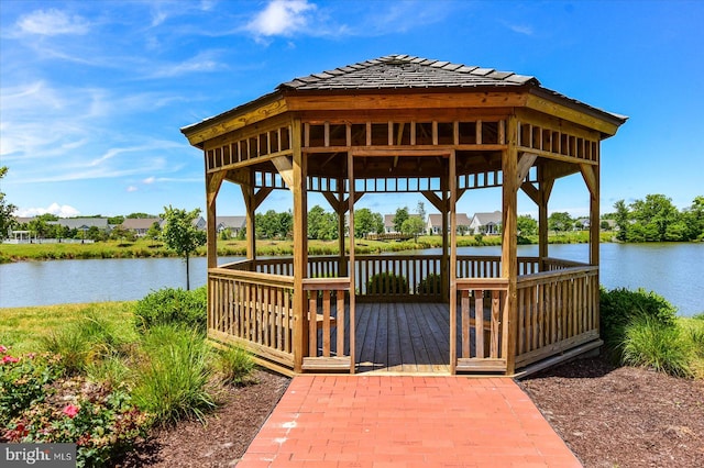 dock area with a deck with water view and a gazebo