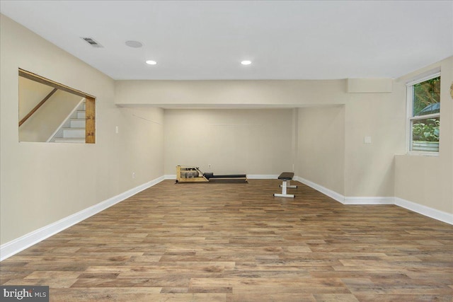 basement featuring light hardwood / wood-style flooring