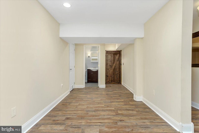 corridor featuring light hardwood / wood-style flooring