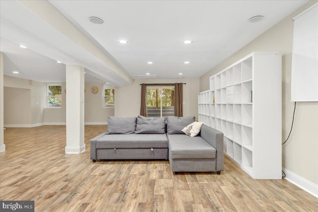 living room with light hardwood / wood-style floors