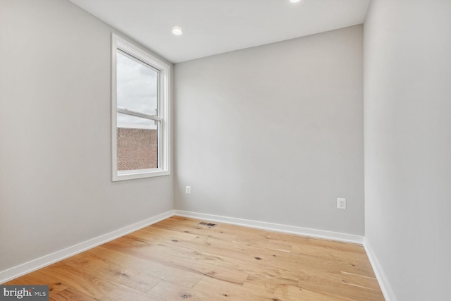 unfurnished room featuring light wood-type flooring