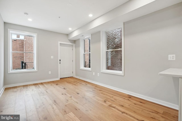 empty room featuring light hardwood / wood-style flooring