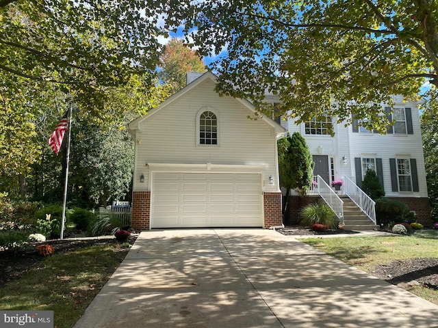 view of front of property featuring a garage