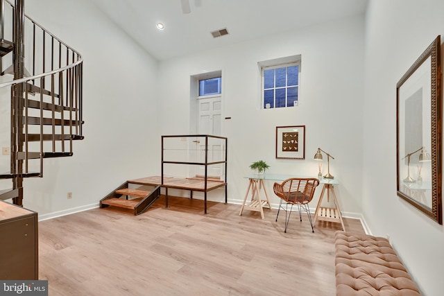 sitting room featuring light wood-type flooring