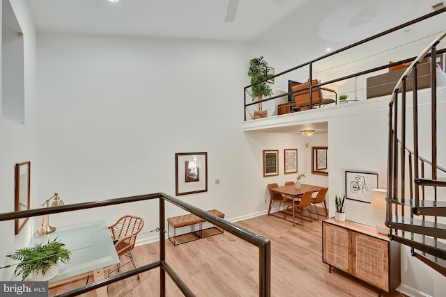 interior space featuring high vaulted ceiling and wood-type flooring