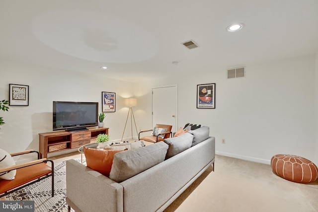 living room with light colored carpet