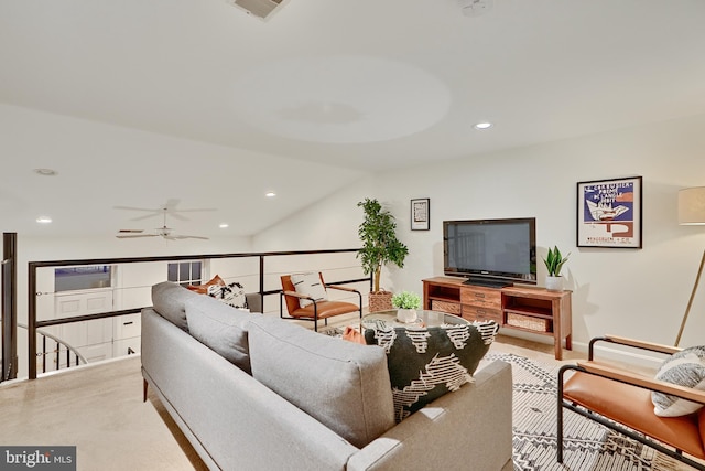 living room with vaulted ceiling and ceiling fan