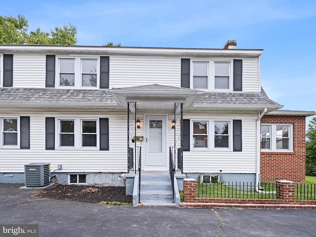 view of front of home featuring central AC unit