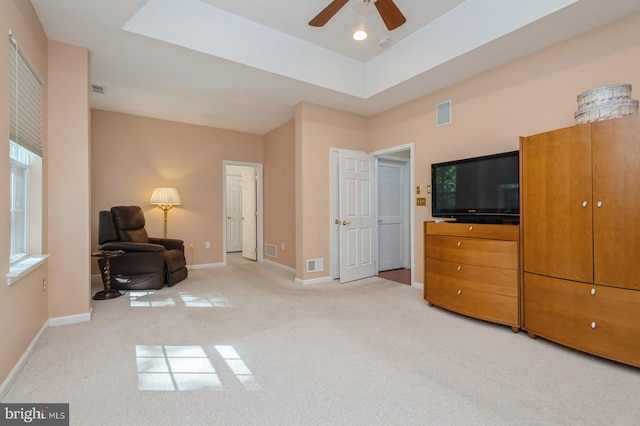 sitting room with light colored carpet and ceiling fan