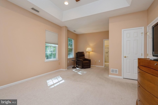 sitting room with light colored carpet