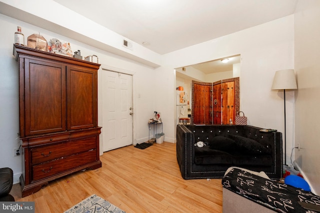 bedroom with light wood-type flooring