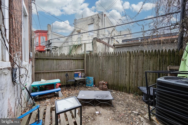 view of patio with central AC