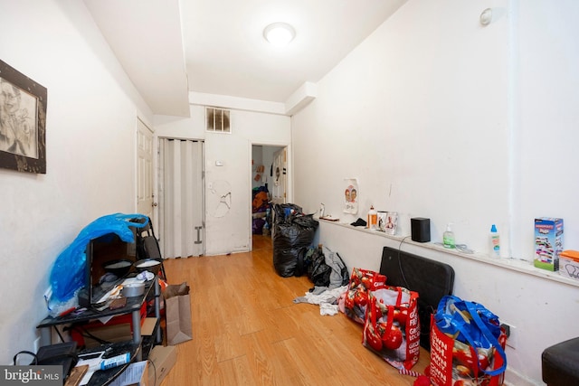 miscellaneous room with hardwood / wood-style flooring