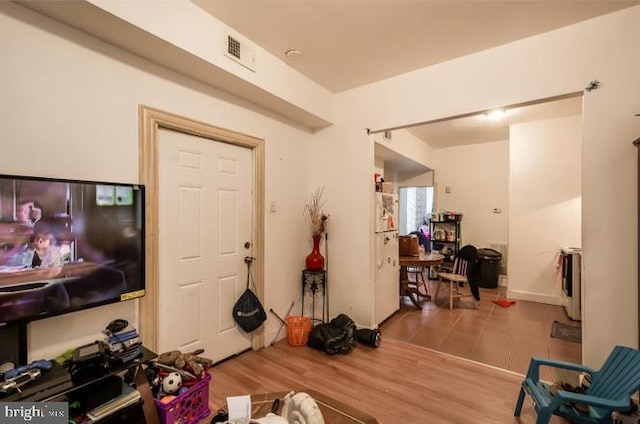 entrance foyer with hardwood / wood-style floors