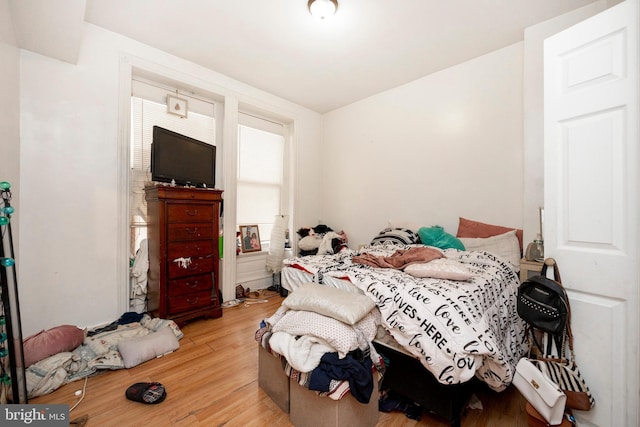 bedroom featuring light wood-type flooring