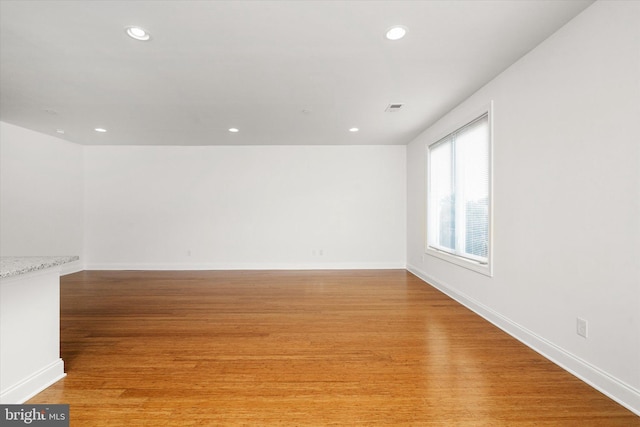 empty room featuring light hardwood / wood-style floors