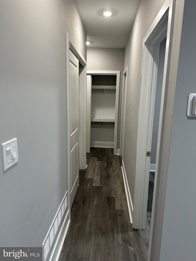 hall featuring dark hardwood / wood-style floors