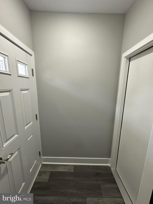 doorway to outside with dark hardwood / wood-style flooring