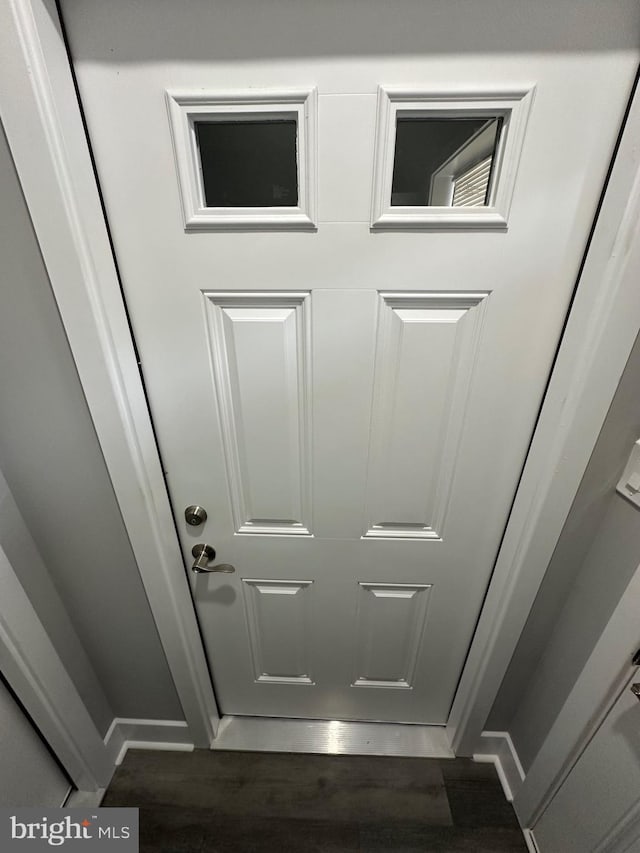 interior details with hardwood / wood-style flooring