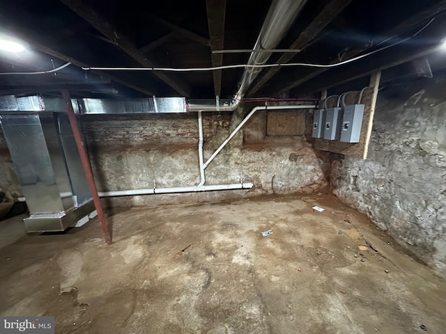 basement featuring heating unit