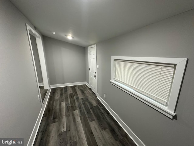 hall featuring dark hardwood / wood-style floors