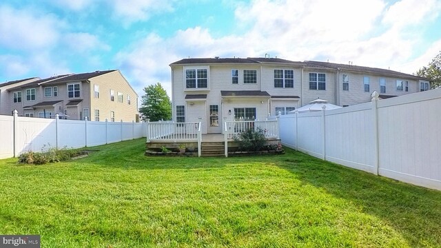 107 Sequoia Dr, Berlin, NJ 08009 - rear view of property with a fenced backyard and a wooden deck