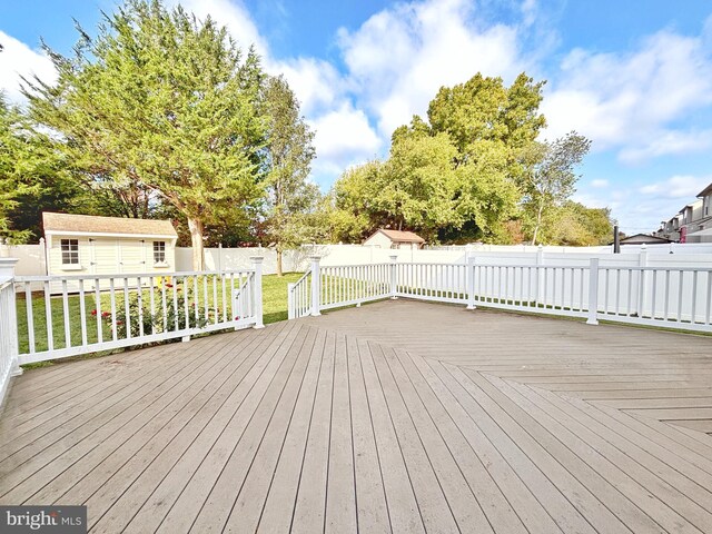 107 Sequoia Dr, Berlin, NJ 08009 - deck with a fenced backyard and a storage unit