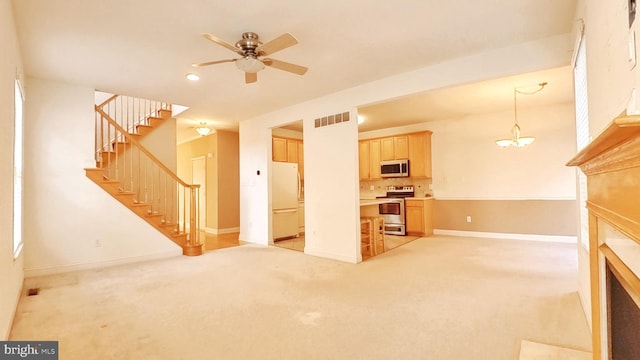 107 Sequoia Dr, Berlin, NJ 08009 - unfurnished living room with ceiling fan, stairs, light carpet, recessed lighting, and a fireplace