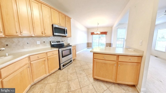 107 Sequoia Dr, Berlin, NJ 08009 - kitchen with stainless steel appliances, light brown cabinetry, tasteful backsplash, and healthy amount of natural light
