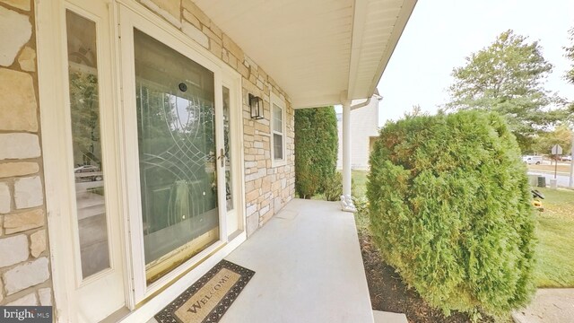 107 Sequoia Dr, Berlin, NJ 08009 - doorway to property featuring stone siding