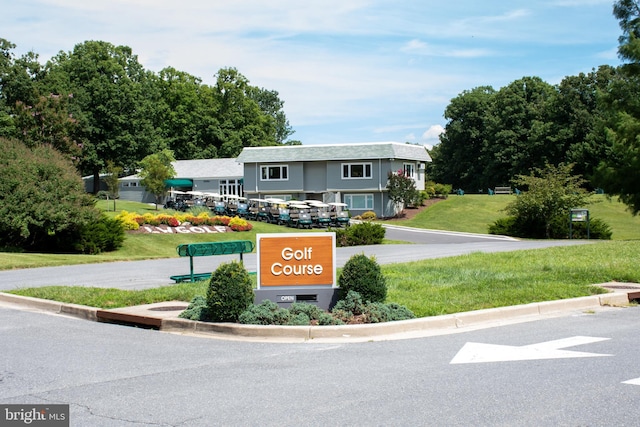 exterior space featuring a front lawn