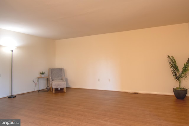 unfurnished room featuring hardwood / wood-style floors